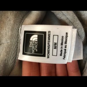 grey north face sweatshirt